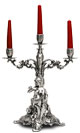 three-flames candelabra - sitting woman holding a bouquet of flowers   cm h 37 left